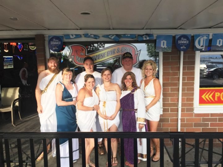  Staff at the Wheel House Bar and Grill before its toga party on Saturday, July 9.     Photo by Tony Fiore.
